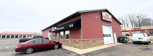 a car parked in front of a house