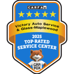Victory Auto Service 2025 Top-Rated CARFAX Service Center badge with Car Fox mascot.